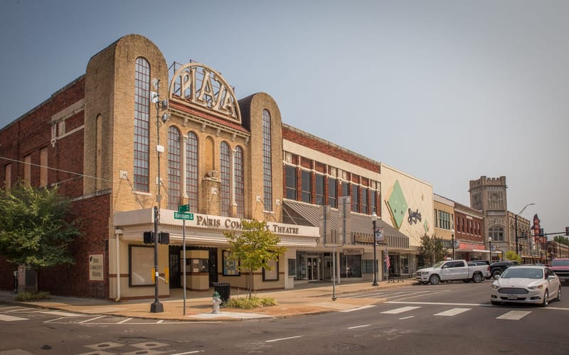 The historic Plaza Theater and storefronts on the downtown square in Paris, Texas