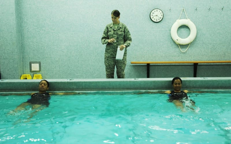A physical therapist guiding a patient through a rehabilitation exercise