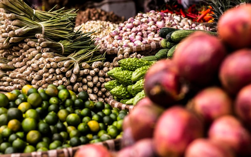 Fresh produce at a farmers market stand