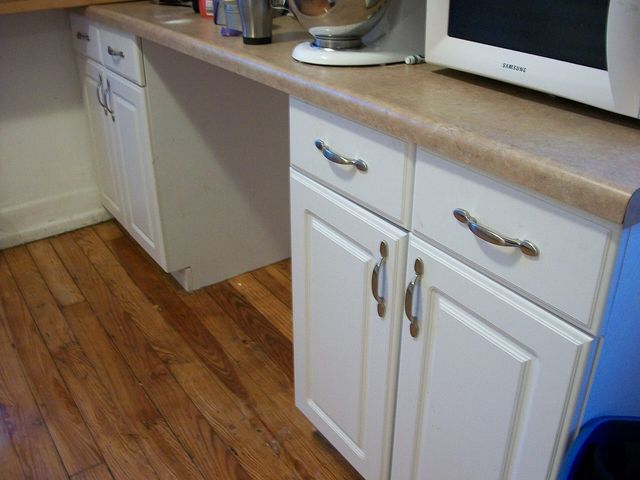 Newly installed kitchen cabinets and drawers