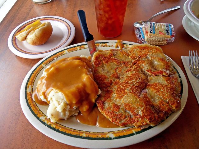 Chicken fried steak topped with cream gravy