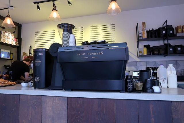 A minimalist coffee bar with an espresso machine