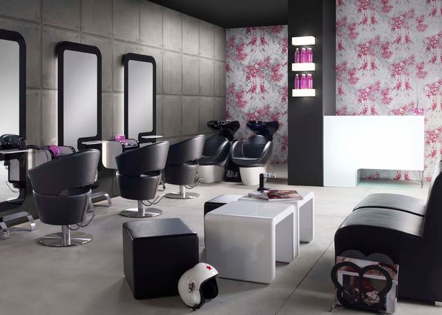 Styling chairs and mirrors inside a hair salon