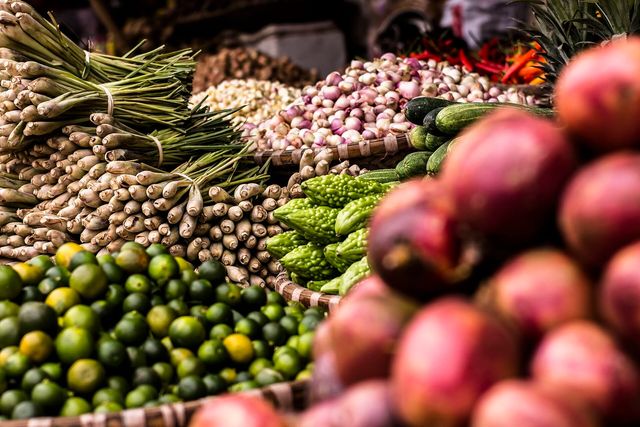 Fresh produce at a farmers market stand