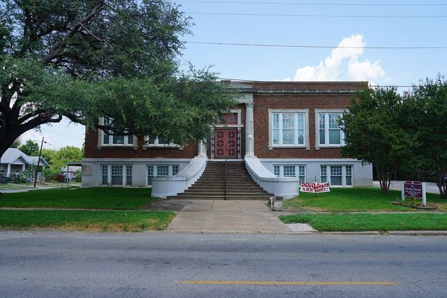 A historic brick building in Sherman, Texas